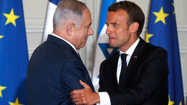 ماكرون لنتنياهو: استمر في التفاوض مع حماس
